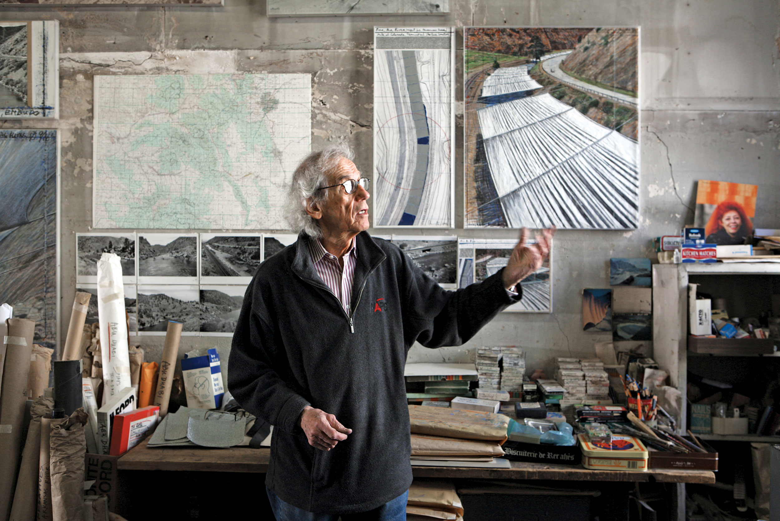 Christo in his studio with a preparatory collage for Over The River 2011 Photo: Wolfgang Volz © 2011 Christo 